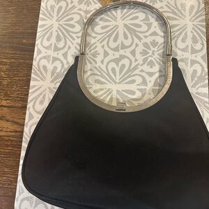 Elegant Black Handbag with Silver Handle